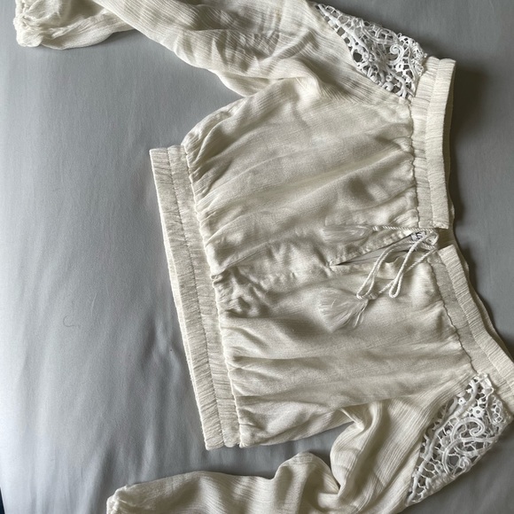 White, over the shoulder crop top with detailed sleeves. - Picture 8 of 8
